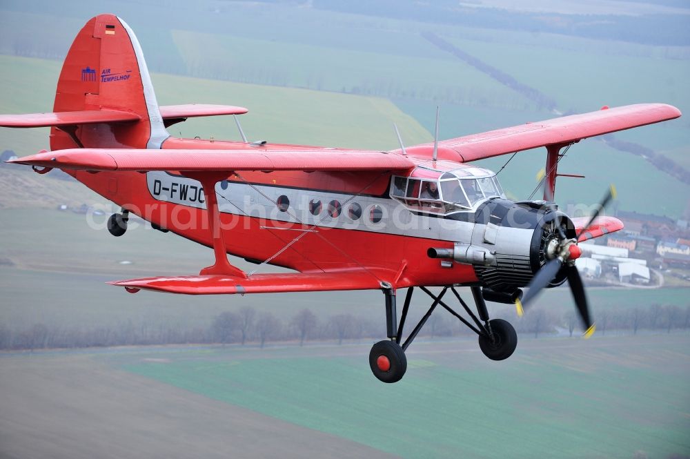 Aerial image Melchow - Antonow AN-2 with of Kennung D-FWJC Aircraft in flight over the airspace in Melchow in the state Brandenburg, Germany