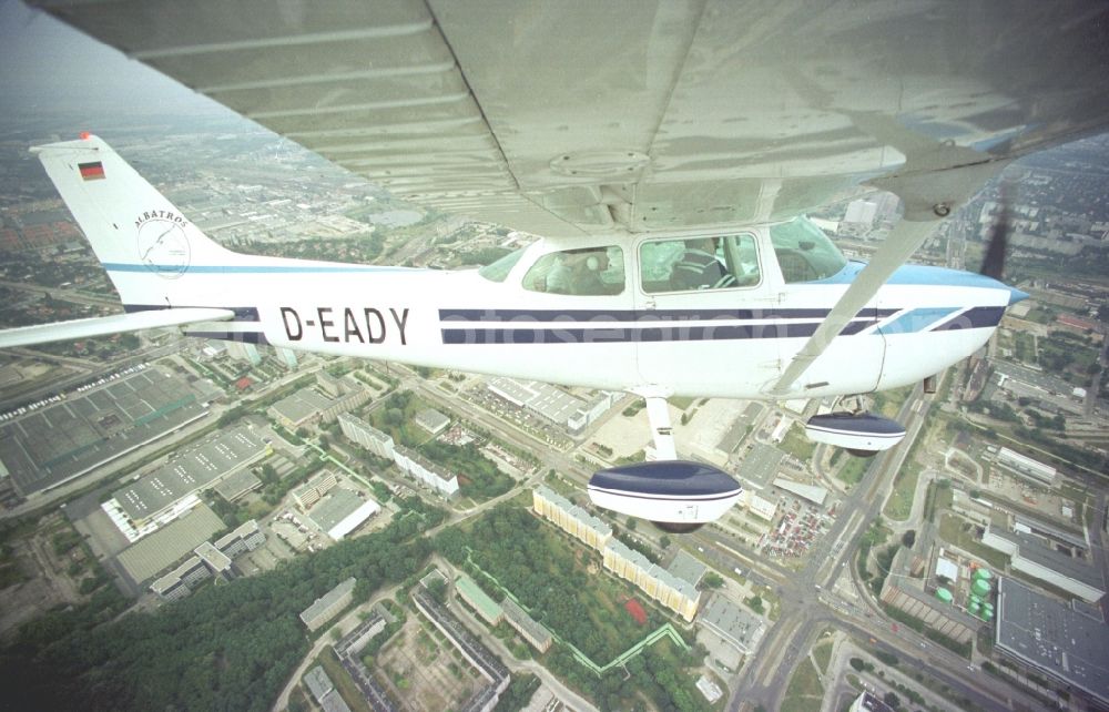 Aerial image Berlin - Cessna 172 with the call sign D-EADY Aircraft in flight over the airspace in Berlin, Germany