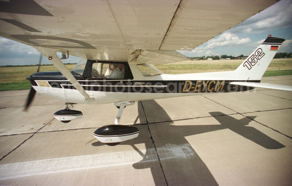 Aerial image Strausberg - Airplane Cessna 152 with the registration D-EYCM taking off from the airfield in Strausberg in the state Brandenburg, Germany