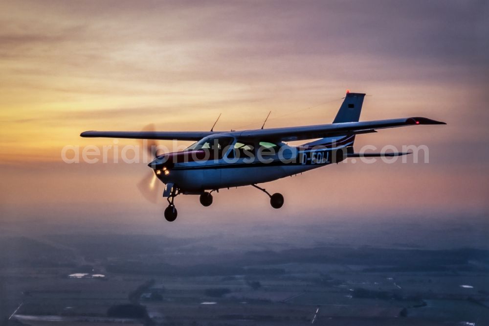 Handewitt from the bird's eye view: Cessna 177 RG Aircraft in flight over the airspace in Handewitt in the state Schleswig-Holstein, Germany