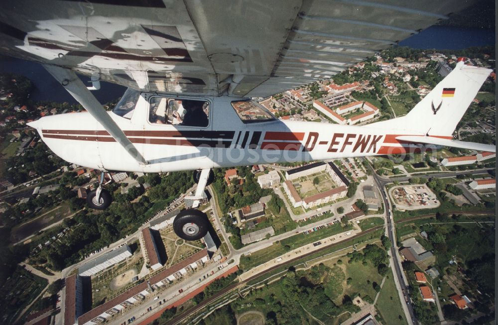 Aerial photograph Strausberg - Cessna 150 D-EFWK Aircraft in flight over the airspace in Strausberg in the state Brandenburg, Germany