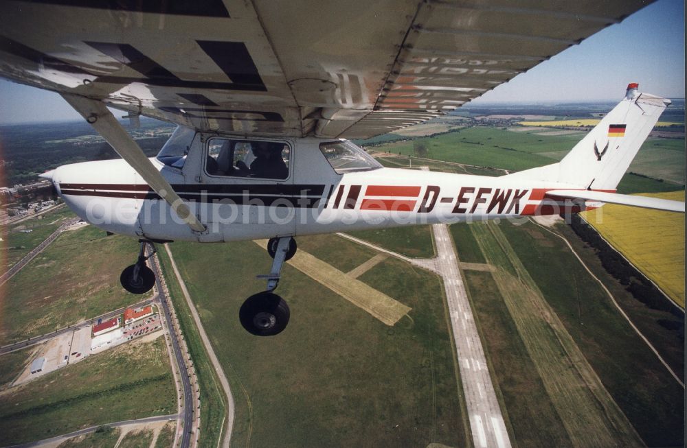 Strausberg from above - Cessna 150 D-EFWK Aircraft in flight over the airspace in Strausberg in the state Brandenburg, Germany