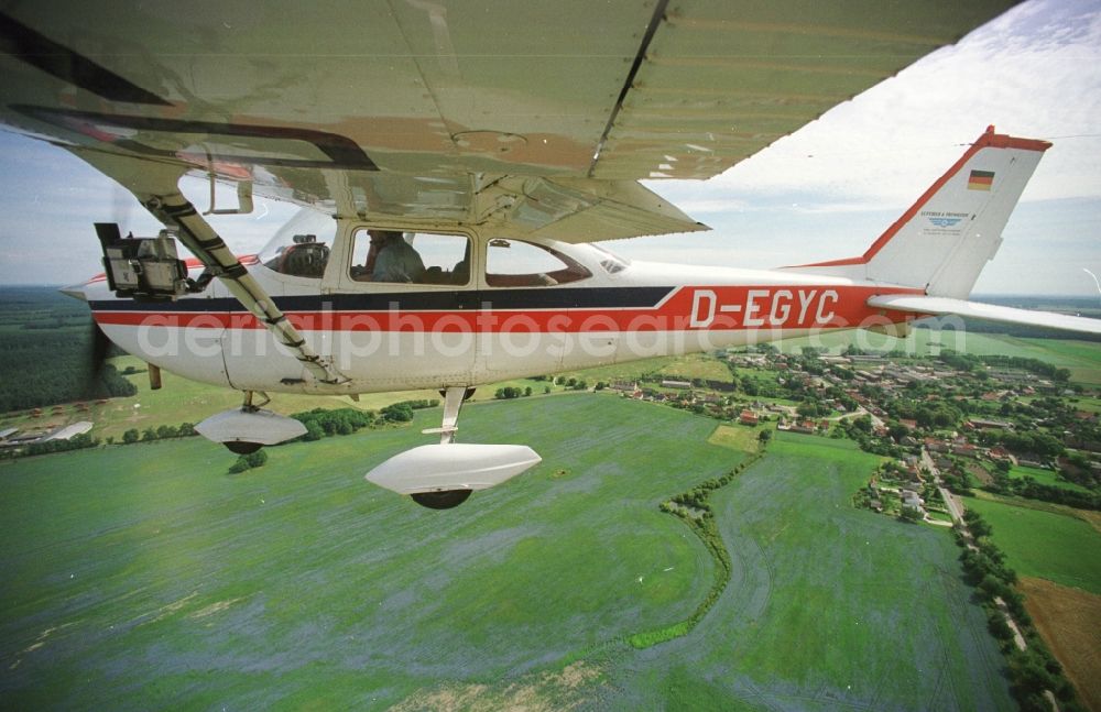 Aerial photograph Strausberg - Cessna 172 with the identifier D-EGYC Aircraft in flight over the airspace in Strausberg in the state Brandenburg, Germany