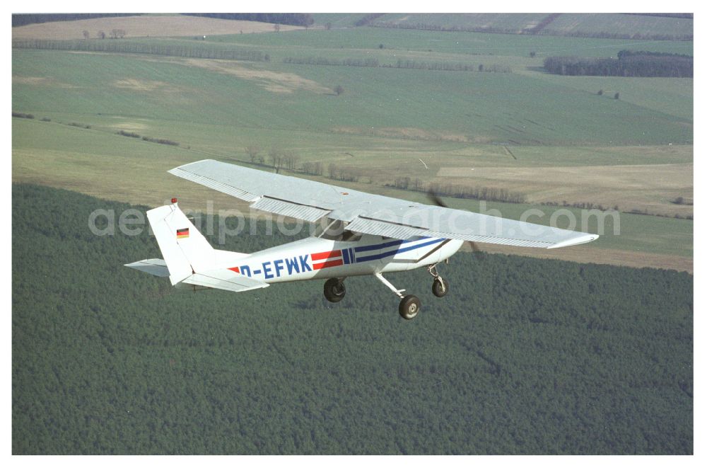 Aerial photograph Strausberg - Cessna 150 D-EFWK Aircraft in flight over the airspace in Strausberg in the state Brandenburg, Germany