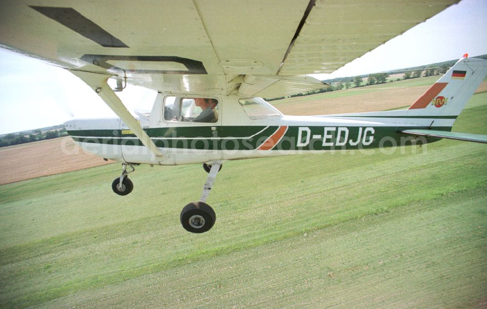 Paulinenaue from above - Cessna 150 with the identifier D-EDJG Aircraft in flight over the airspace on street Lindholzfarm in the district Selbelang in Paulinenaue in the state Brandenburg, Germany