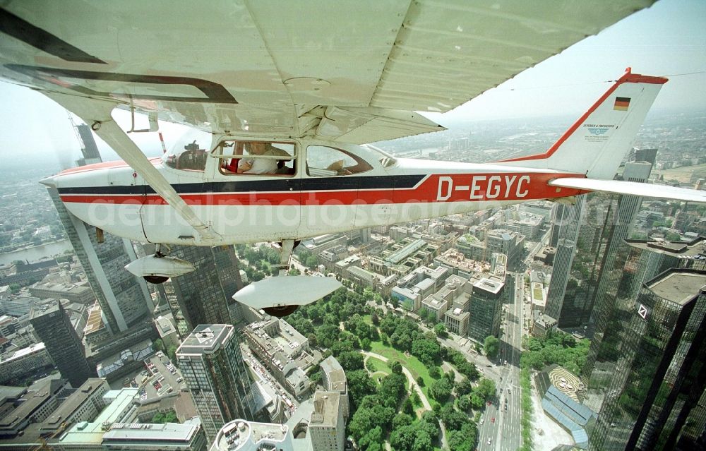 Frankfurt am Main from the bird's eye view: Cessna 172 with the identifier D-EGYC Aircraft in flight over the airspace in Frankfurt in the state Hesse, Germany