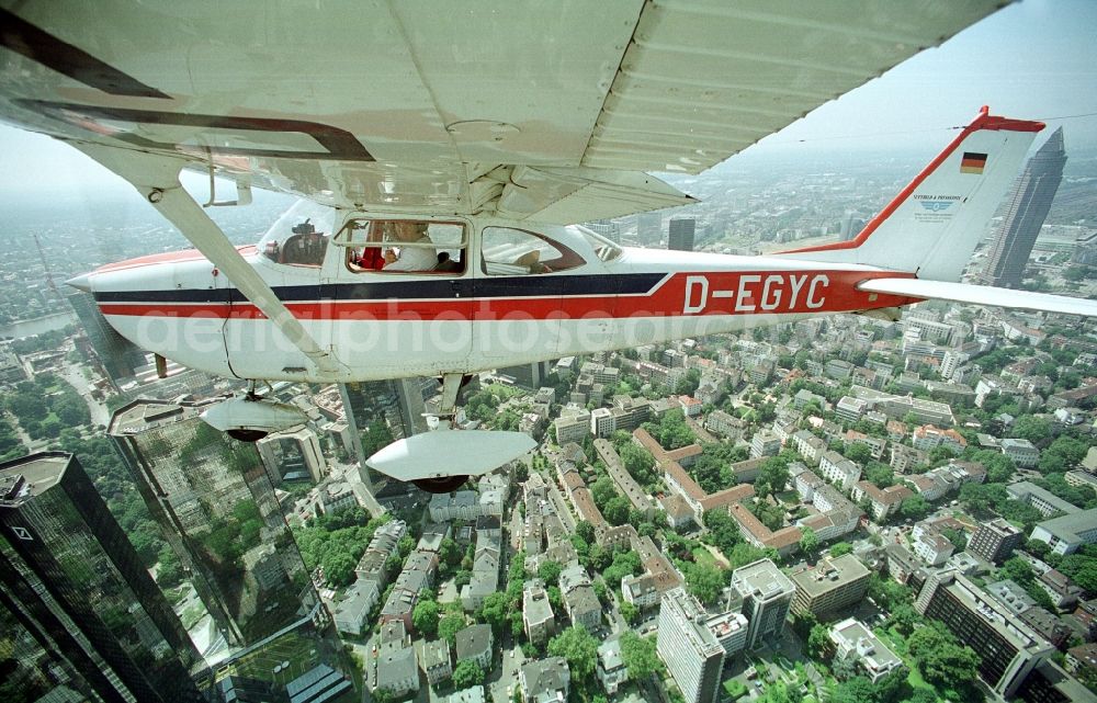 Frankfurt am Main from the bird's eye view: Cessna 172 with the identifier D-EGYC Aircraft in flight over the airspace in Frankfurt in the state Hesse, Germany