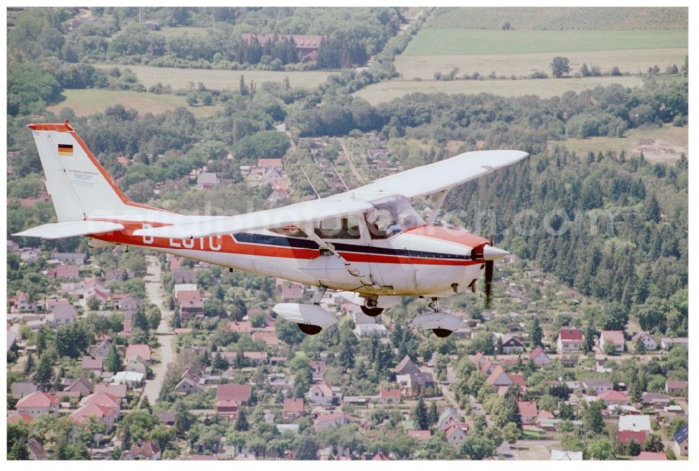 Aerial image Fürstenwalde/Spree - Cessna F172H with call sign D-EGYC Aircraft in flight over the airspace in Fuerstenwalde/Spree in the state Brandenburg, Germany