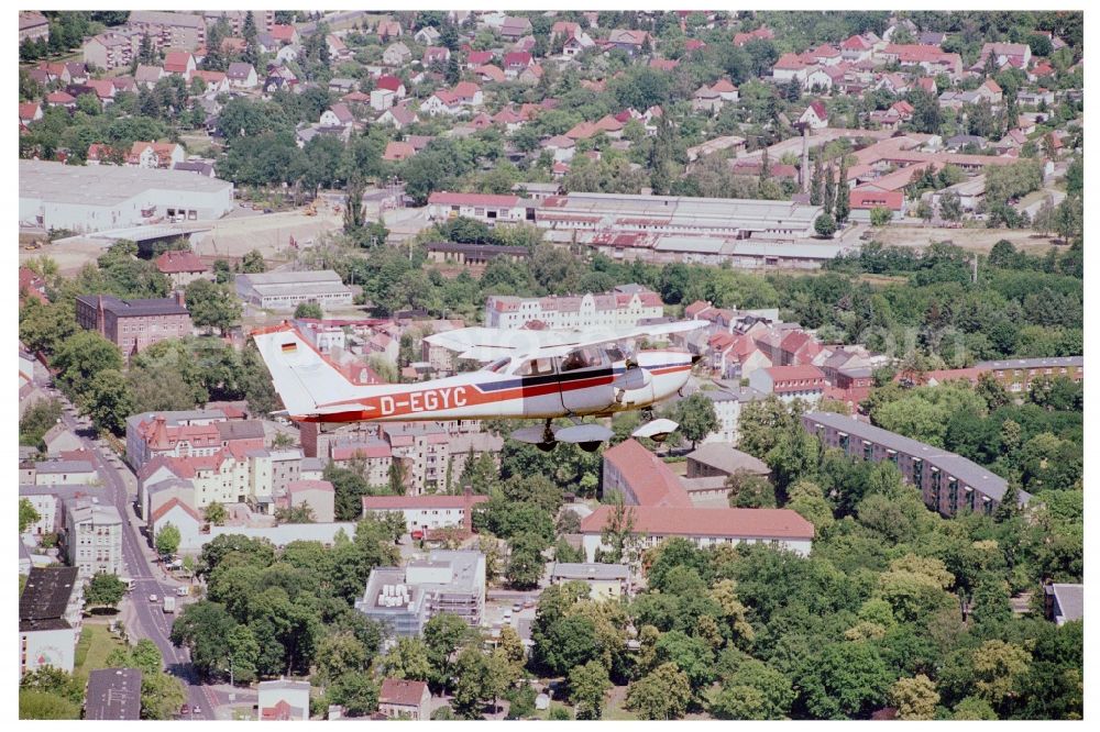 Fürstenwalde/Spree from the bird's eye view: Cessna F172H with call sign D-EGYC Aircraft in flight over the airspace in Fuerstenwalde/Spree in the state Brandenburg, Germany