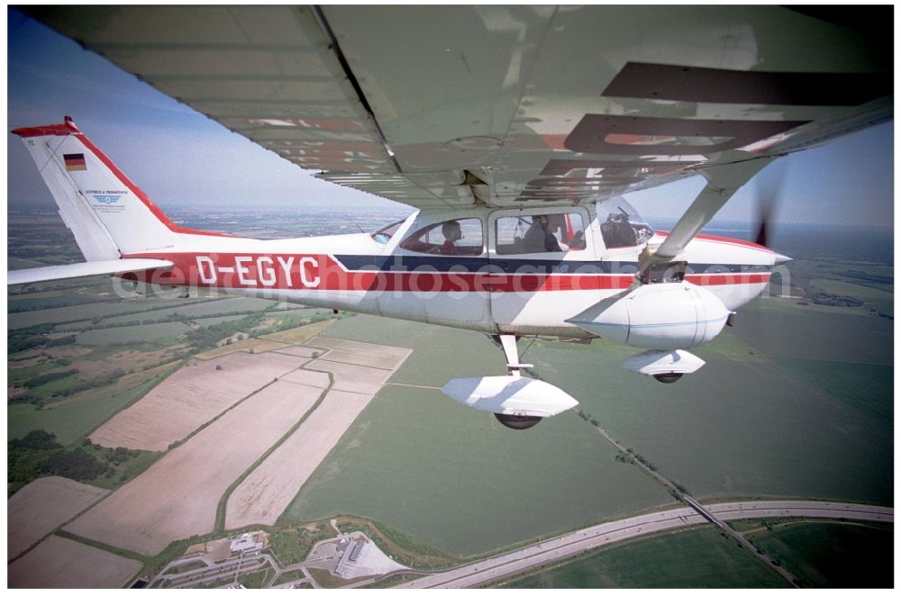 Aerial photograph Groß Kienitz - Cessna 172 with the identifier D-EGYC Aircraft in flight over the airspace in Gross Kienitz in the state Brandenburg, Germany