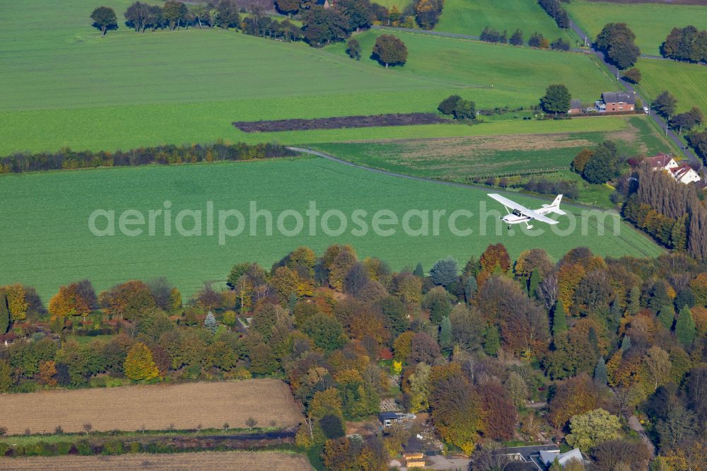 Olfen from the bird's eye view: Aircraft in flight over the airspace in Olfen in the state North Rhine-Westphalia, Germany