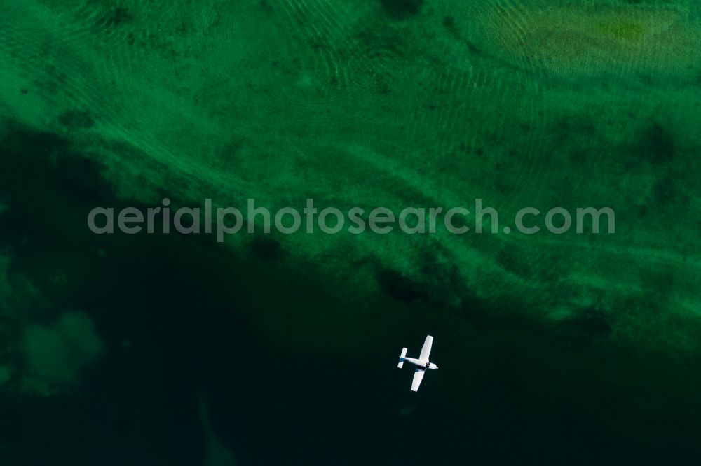 Reichenau from above - Aircraft in flight over the Wollmatinger Ried - Untersee - Gnadensee in Reichenau at Bodensee in the state Baden-Wuerttemberg, Germany