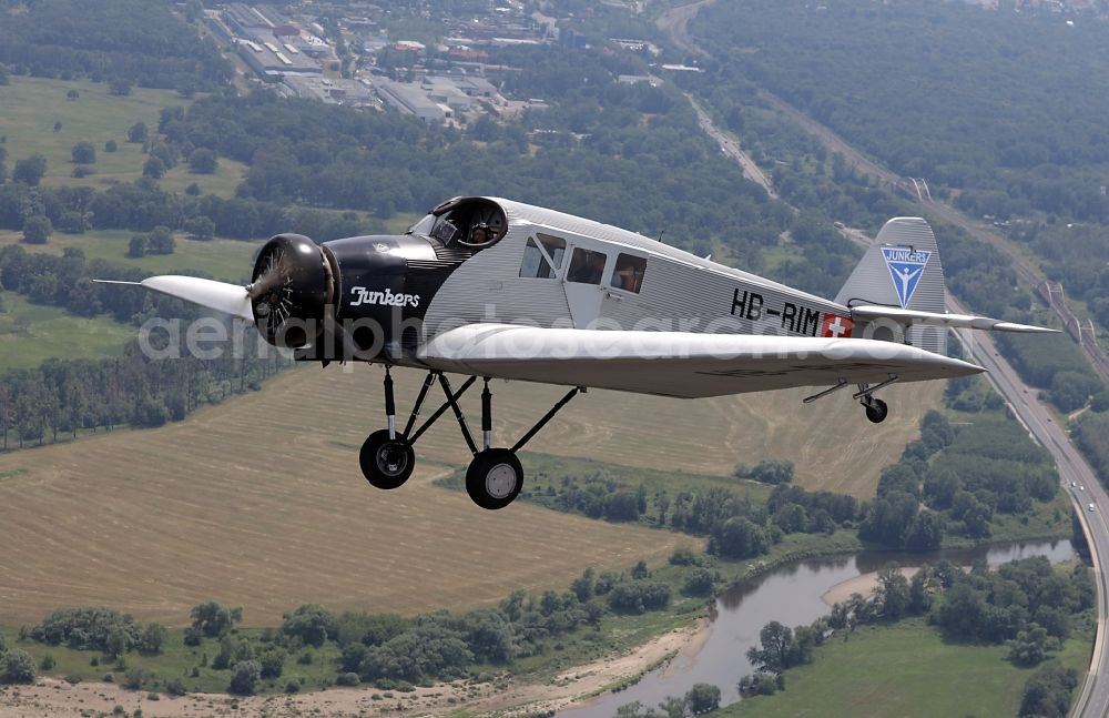 Aerial photograph Dessau - Junkers F13 Aircraft in flight over the airspace in Dessau in the state Saxony-Anhalt, Germany