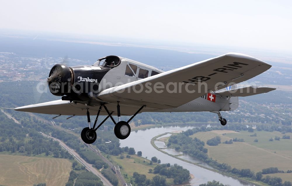 Dessau from above - Junkers F13 Aircraft in flight over the airspace in Dessau in the state Saxony-Anhalt, Germany