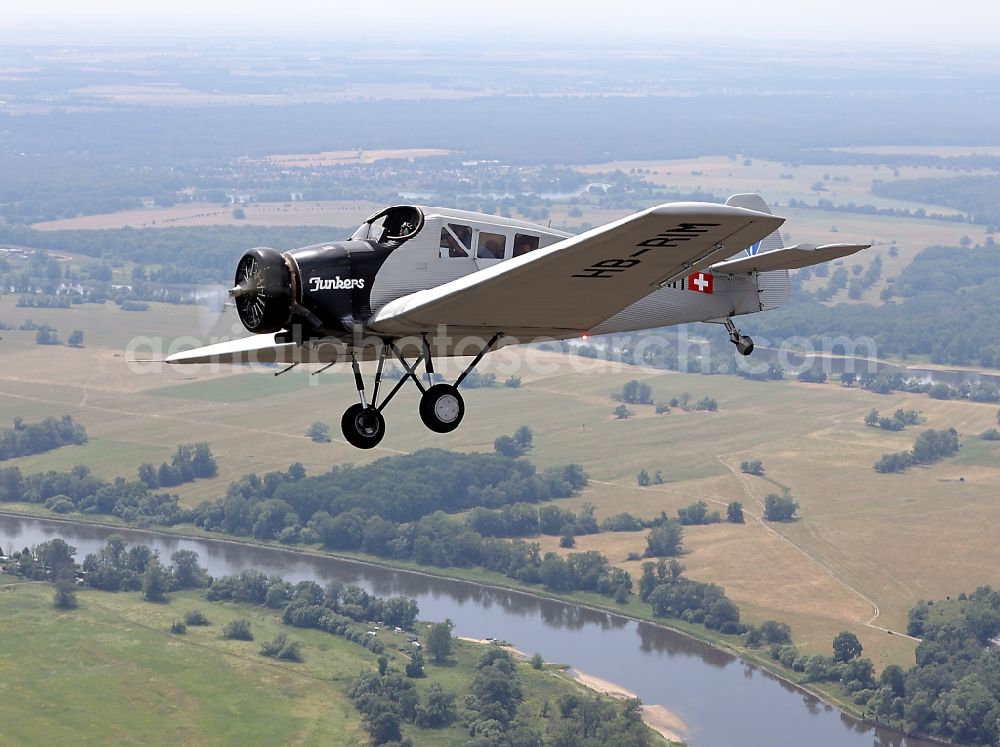 Aerial photograph Dessau - Junkers F13 Aircraft in flight over the airspace in Dessau in the state Saxony-Anhalt, Germany