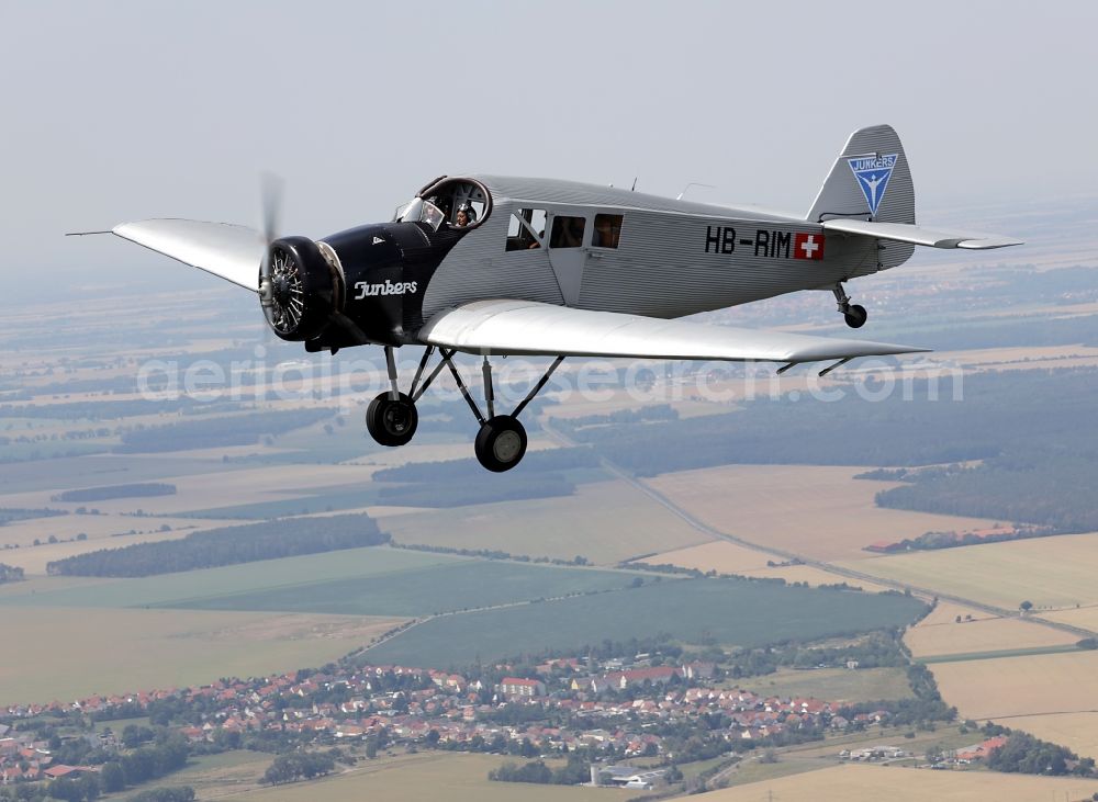 Aerial image Dessau - Junkers F13 Aircraft in flight over the airspace in Dessau in the state Saxony-Anhalt, Germany