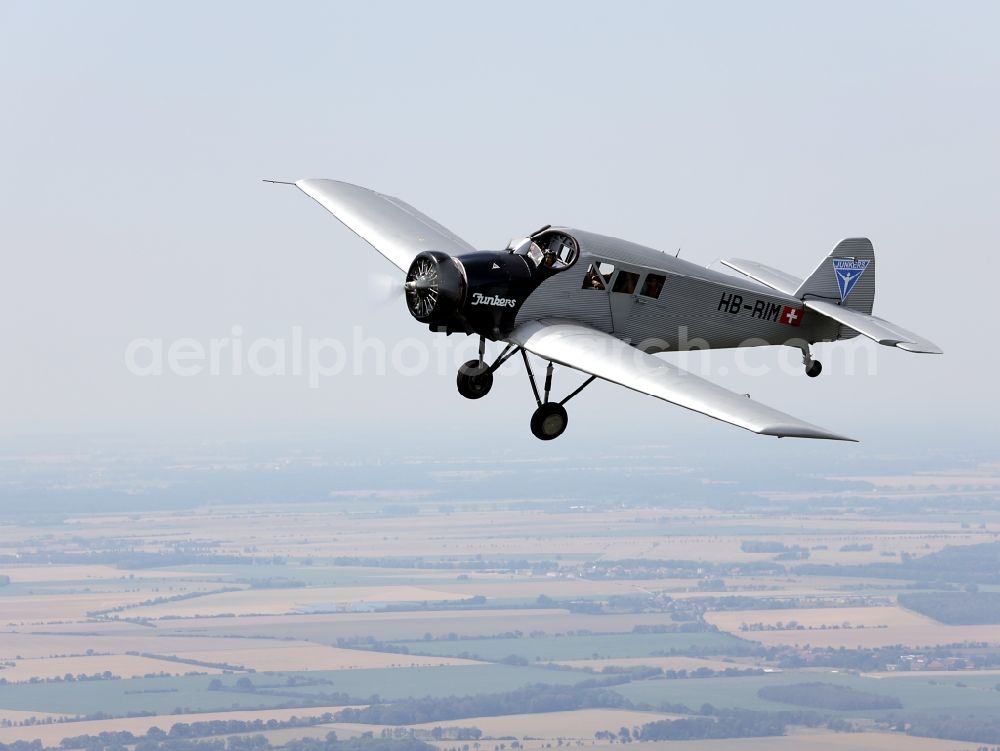 Dessau from above - Junkers F13 Aircraft in flight over the airspace in Dessau in the state Saxony-Anhalt, Germany