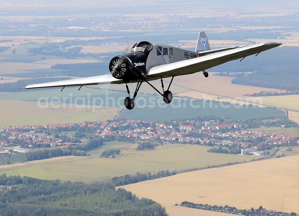 Aerial image Dessau - Junkers F13 Aircraft in flight over the airspace in Dessau in the state Saxony-Anhalt, Germany