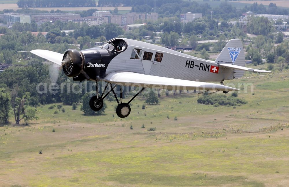 Aerial photograph Dessau - Junkers F13 Aircraft in flight over the airspace in Dessau in the state Saxony-Anhalt, Germany