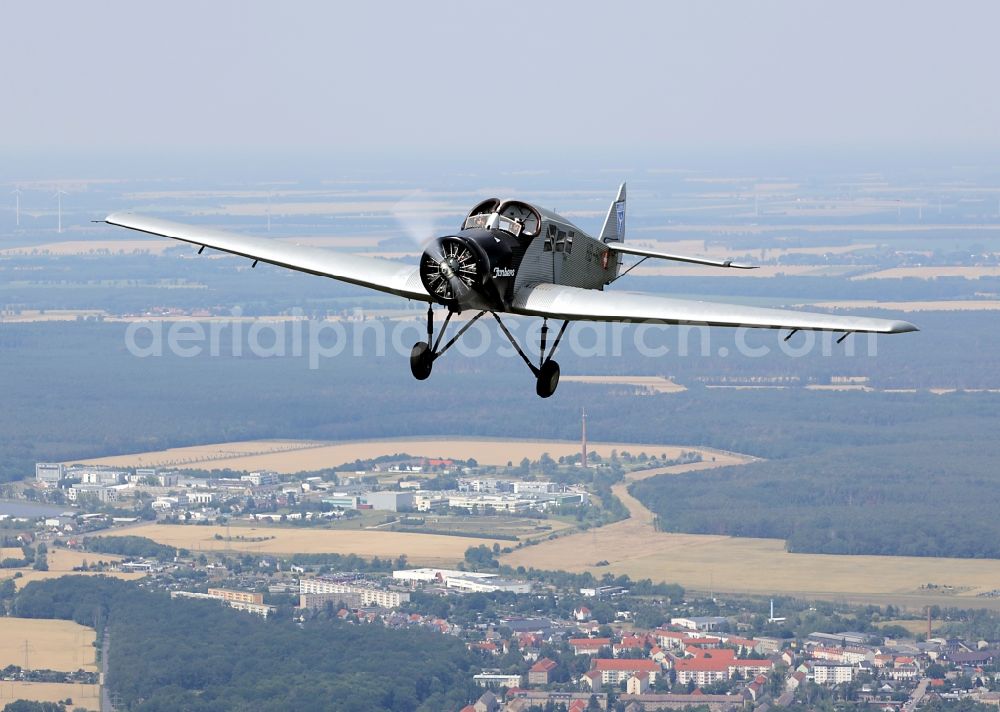 Aerial photograph Dessau - Junkers F13 Aircraft in flight over the airspace in Dessau in the state Saxony-Anhalt, Germany