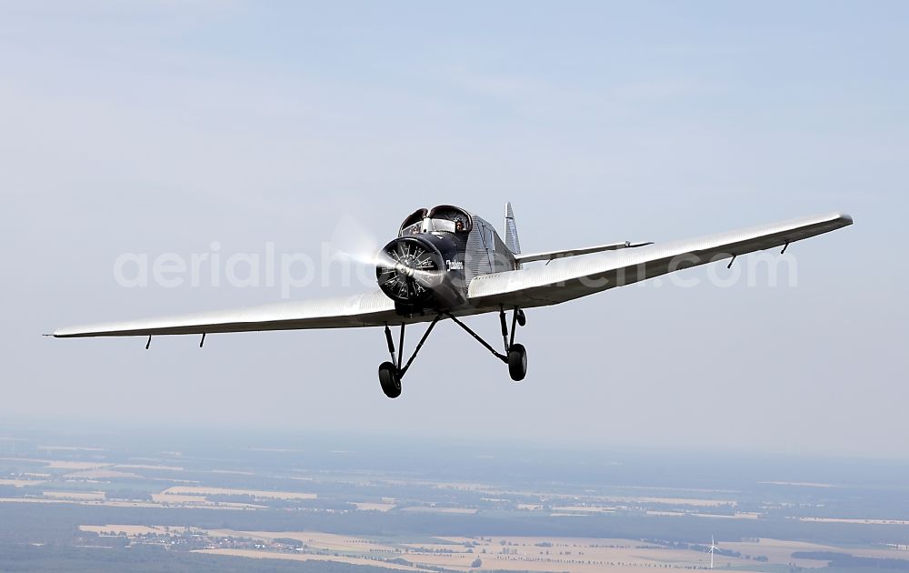 Dessau from above - Junkers F13 Aircraft in flight over the airspace in Dessau in the state Saxony-Anhalt, Germany