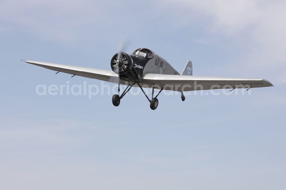 Aerial photograph Dessau - Junkers F13 Aircraft in flight over the airspace in Dessau in the state Saxony-Anhalt, Germany