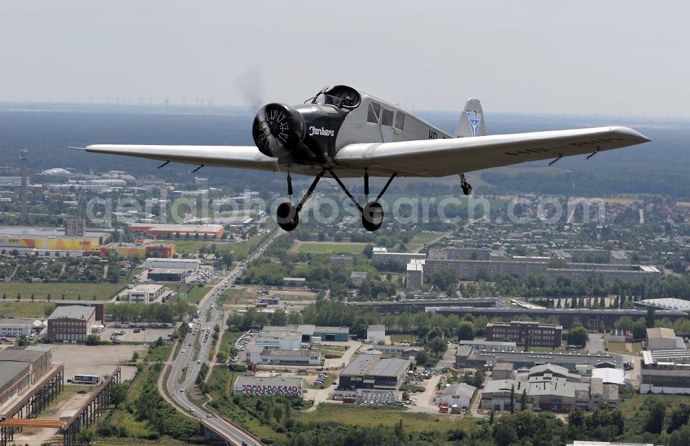 Dessau from above - Junkers F13 Aircraft in flight over the airspace in Dessau in the state Saxony-Anhalt, Germany