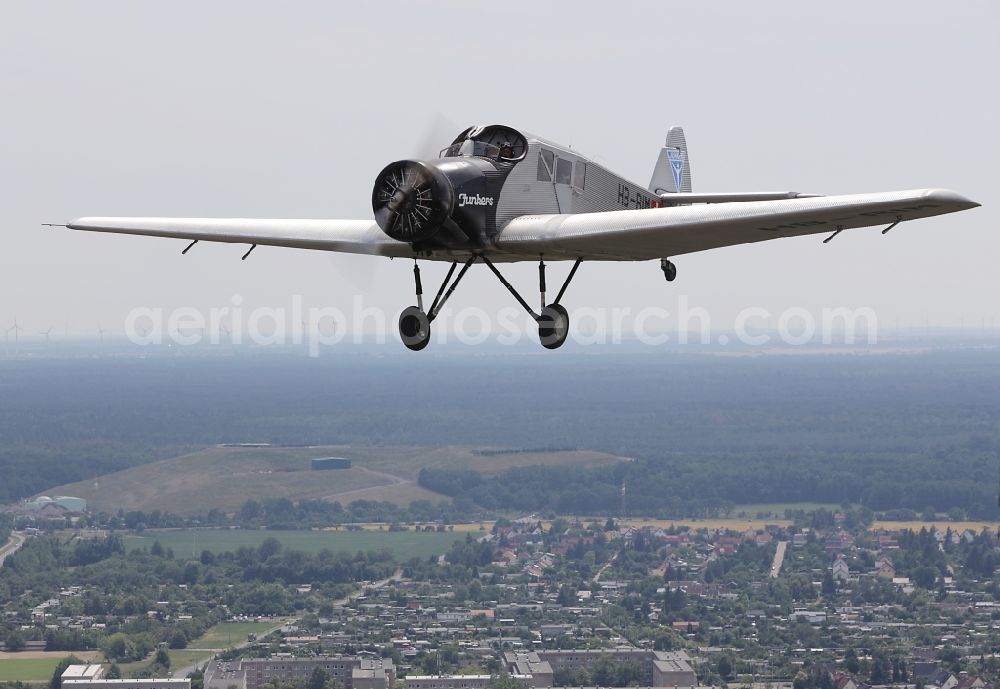 Dessau from the bird's eye view: Junkers F13 Aircraft in flight over the airspace in Dessau in the state Saxony-Anhalt, Germany