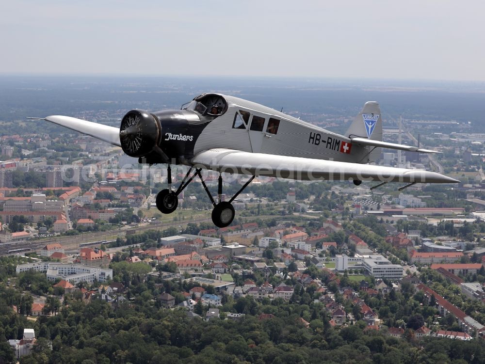 Aerial image Dessau - Junkers F13 Aircraft in flight over the airspace in Dessau in the state Saxony-Anhalt, Germany