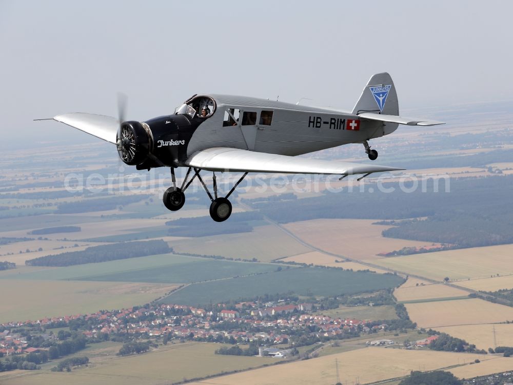 Aerial photograph Dessau - Junkers F13 Aircraft in flight over the airspace in Dessau in the state Saxony-Anhalt, Germany