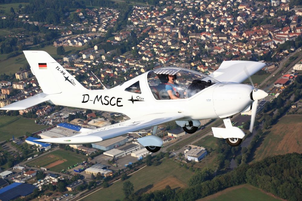 Aerial photograph Steinen - Ultralight aircraft TL-96 Star with callsign D-MSCE in flight in the airspace over Steinen in the state Baden-Wuerttemberg