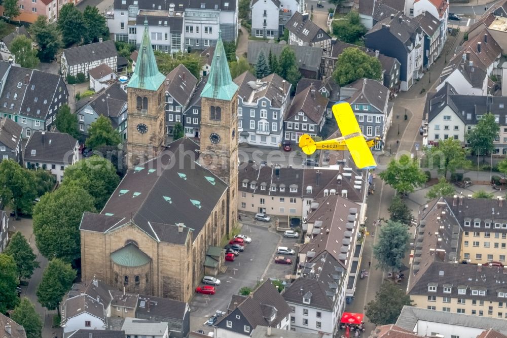 Aerial photograph Schwelm - Piper J-3C-85 Cub D-ECZI Aircraft in flight over the airspace in Schwelm in the state North Rhine-Westphalia, Germany