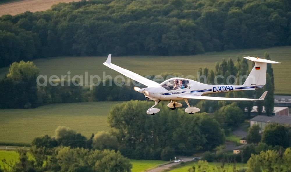 Hamm from above - HK36 TC Super-Dimona with of Kennung D-KDHA Aircraft in flight over the airspace in Hamm in the state North Rhine-Westphalia, Germany