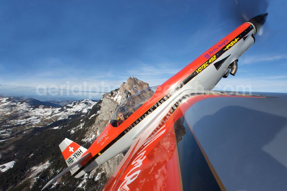 Aerial image Birrfeld - Kunstflugzeug / Flugzeug vom Typ VOTEC 452 mit der schweizer Kennung HB-YNH nahe dem Flugplatz Birrfeld / Schweiz. Aerobatic aircraft near by the Birrfeld airfield in Switzerland.