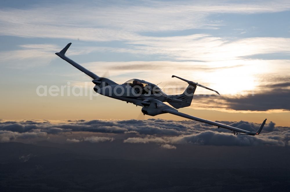 Aerial photograph Wiener Neustadt - Diamond DA42 NG OE-VFT Aircraft in flight over the airspace in Wiener Neustadt in Oesterreich