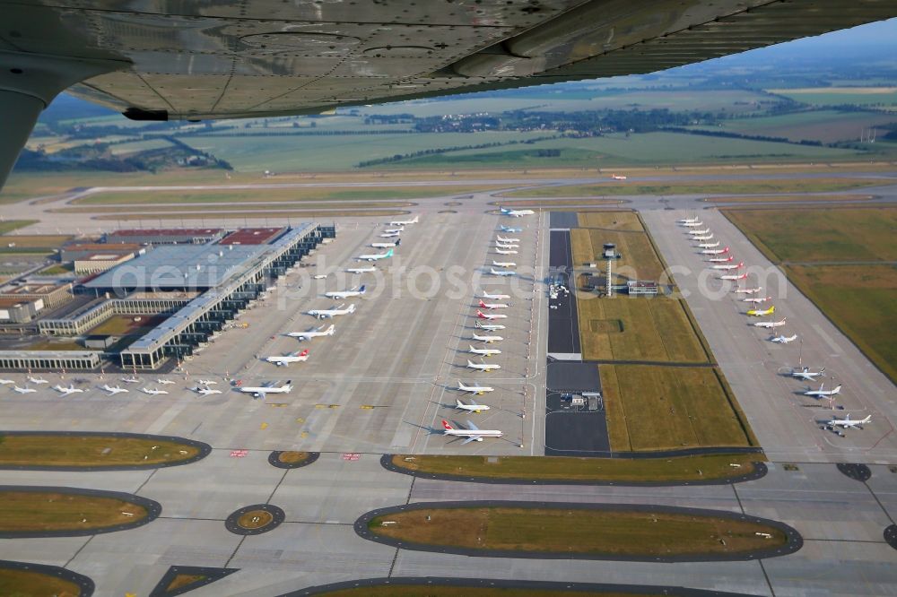 Schönefeld from above - Views of the apron of the BER airport in Schoenefeld in the State of Brandenburg. The aircrafts are flown on the occasion of the Champion League final 2015