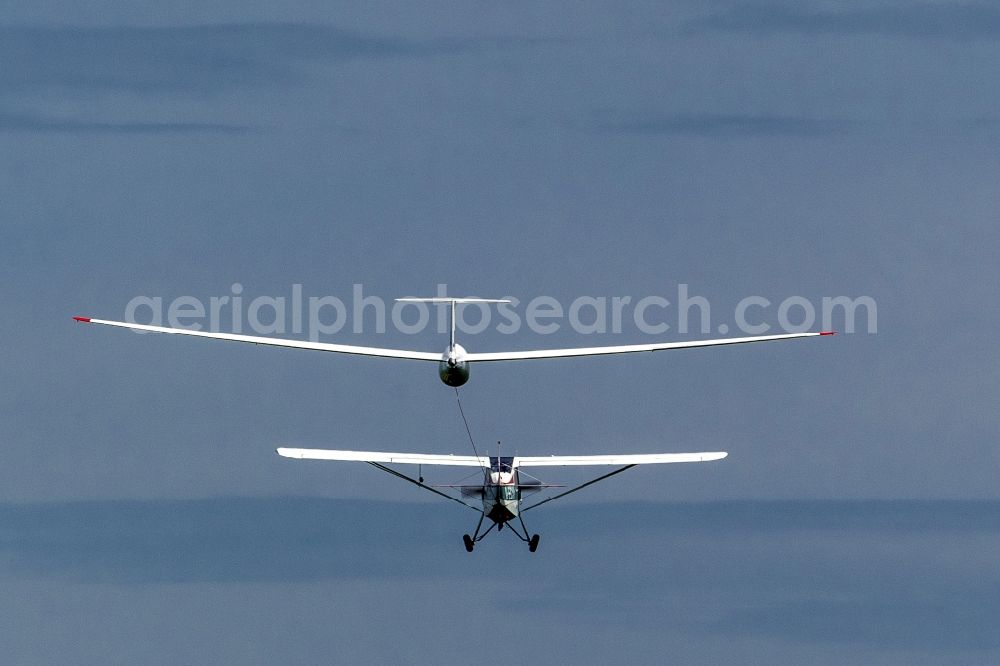 Hamm from above - Aerotowing association with an Aeronca Champion 7GCB D ECVY as a tow plane and a power-seater sailplane DG 300 over Hamm in North Rhine-Westphalia