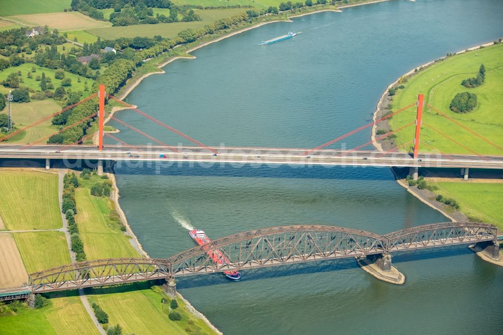 Aerial image Duisburg - River - bridge construction - A42 highway bridge and railway bridge over the Rhine in Duisburg in North Rhine-Westphalia