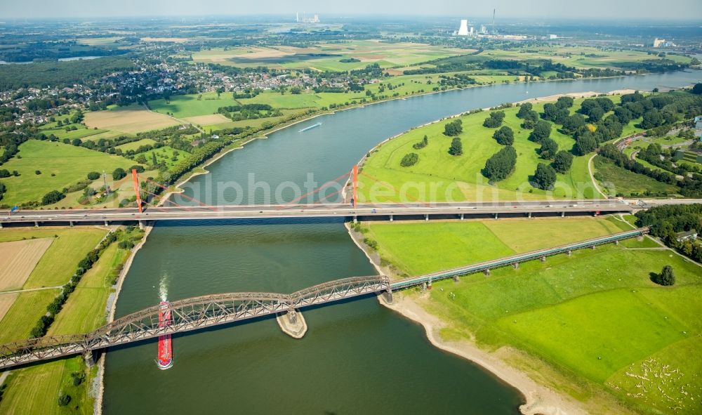 Aerial image Duisburg - River - bridge construction - A42 highway bridge and railway bridge over the Rhine in Duisburg in North Rhine-Westphalia