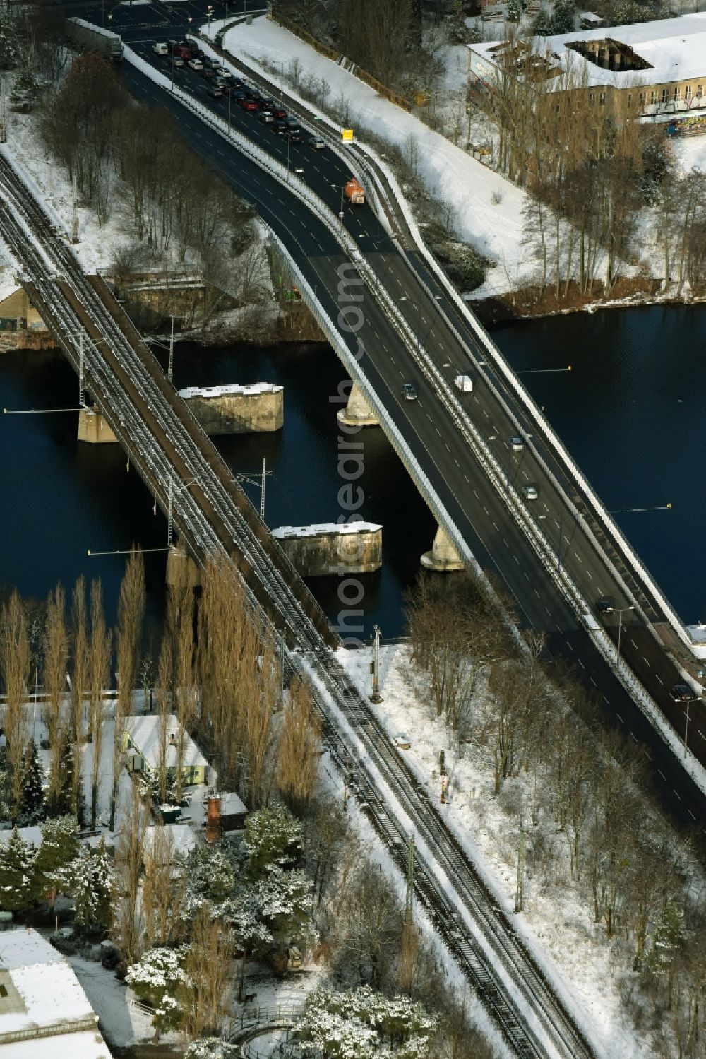 Aerial image Berlin - River - bridge construction over the Spree river aloung Spindlersfelder Strasse in Berlin in Germany