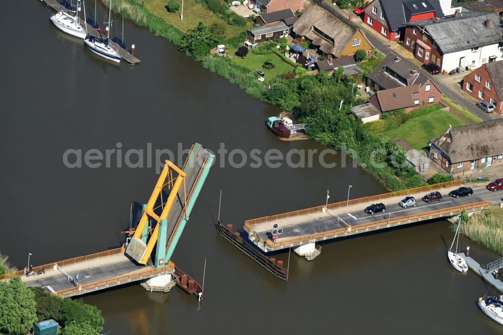 Aerial photograph Heiligenstedten - River - bridge construction the bascule bridge on the banks of the Stoer river path in Heiligenstedten in the state Schleswig-Holstein