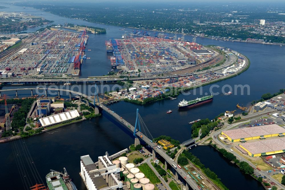 Aerial image Hamburg - View of the river - bridge construction der Kohlbrandbruecke over the river Elbe and the Port Waltershof with countless containers and cranes in Hamburg in Germany