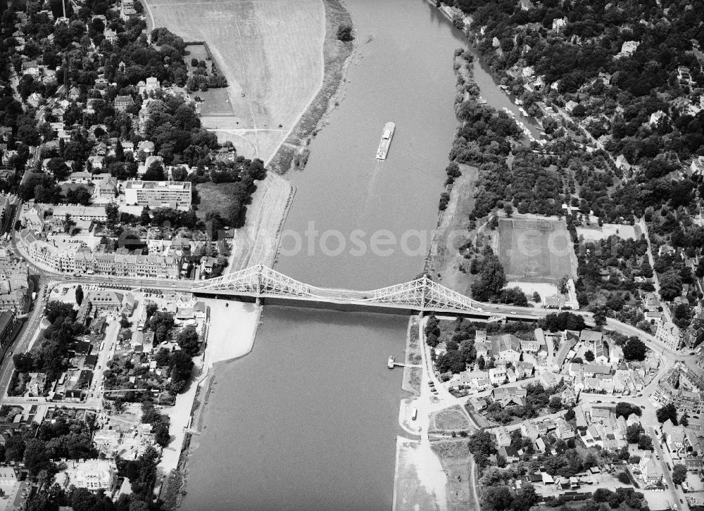 Dresden from the bird's eye view: River - bridge building work Loschwitzer bridge over the Elbe in Dresden in the federal state Saxony. The bridge is also called in the vernacular nasty surprise