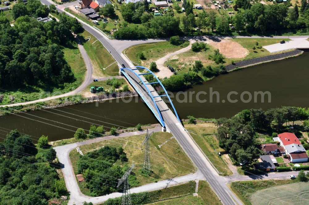 Wusterwitz from the bird's eye view: Strassenbruecke Wusterwitz Bridge across the Elbe-Havel-Canal in the North of Wusterwitz in the state of Brandenburg. The county road L96 takes its course across the blue steel arc bridge