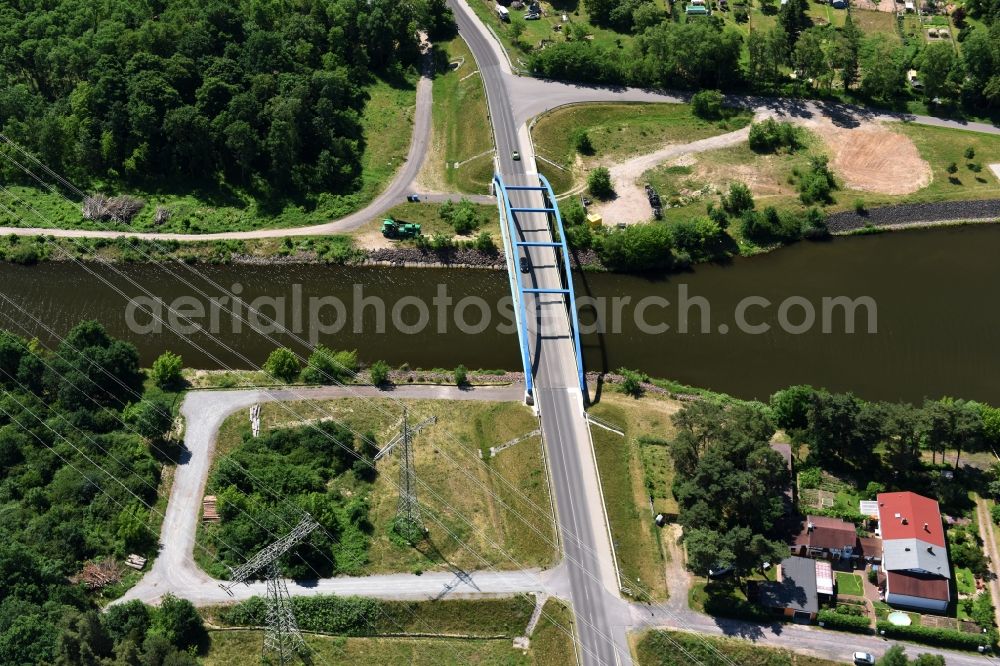 Aerial image Wusterwitz - Strassenbruecke Wusterwitz Bridge across the Elbe-Havel-Canal in the North of Wusterwitz in the state of Brandenburg. The county road L96 takes its course across the blue steel arc bridge