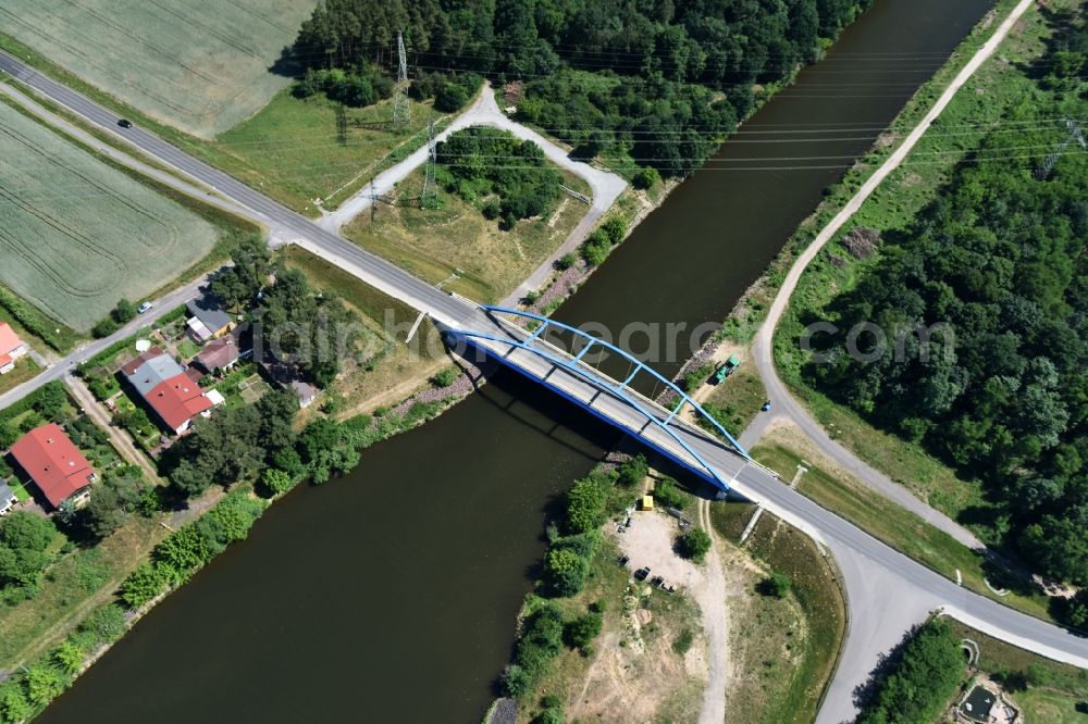 Aerial photograph Wusterwitz - Strassenbruecke Wusterwitz Bridge across the Elbe-Havel-Canal in the North of Wusterwitz in the state of Brandenburg. The county road L96 takes its course across the blue steel arc bridge