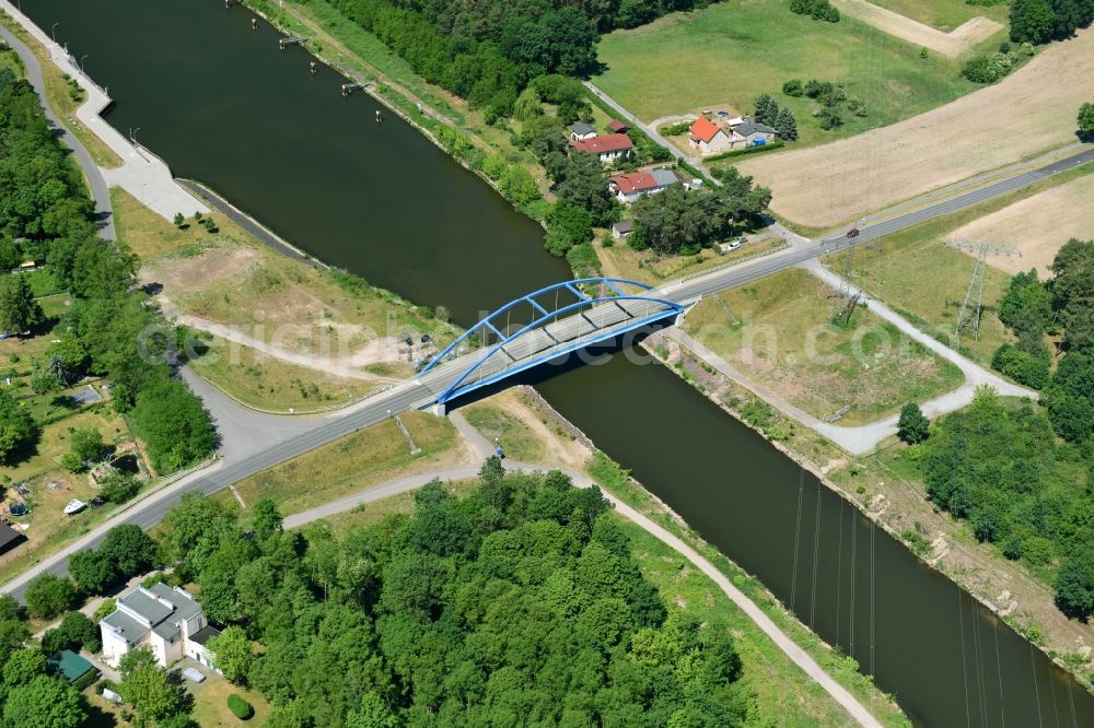 Wusterwitz from the bird's eye view: Strassenbruecke Wusterwitz Bridge across the Elbe-Havel-Canal in the North of Wusterwitz in the state of Brandenburg. The county road L96 takes its course across the blue steel arc bridge