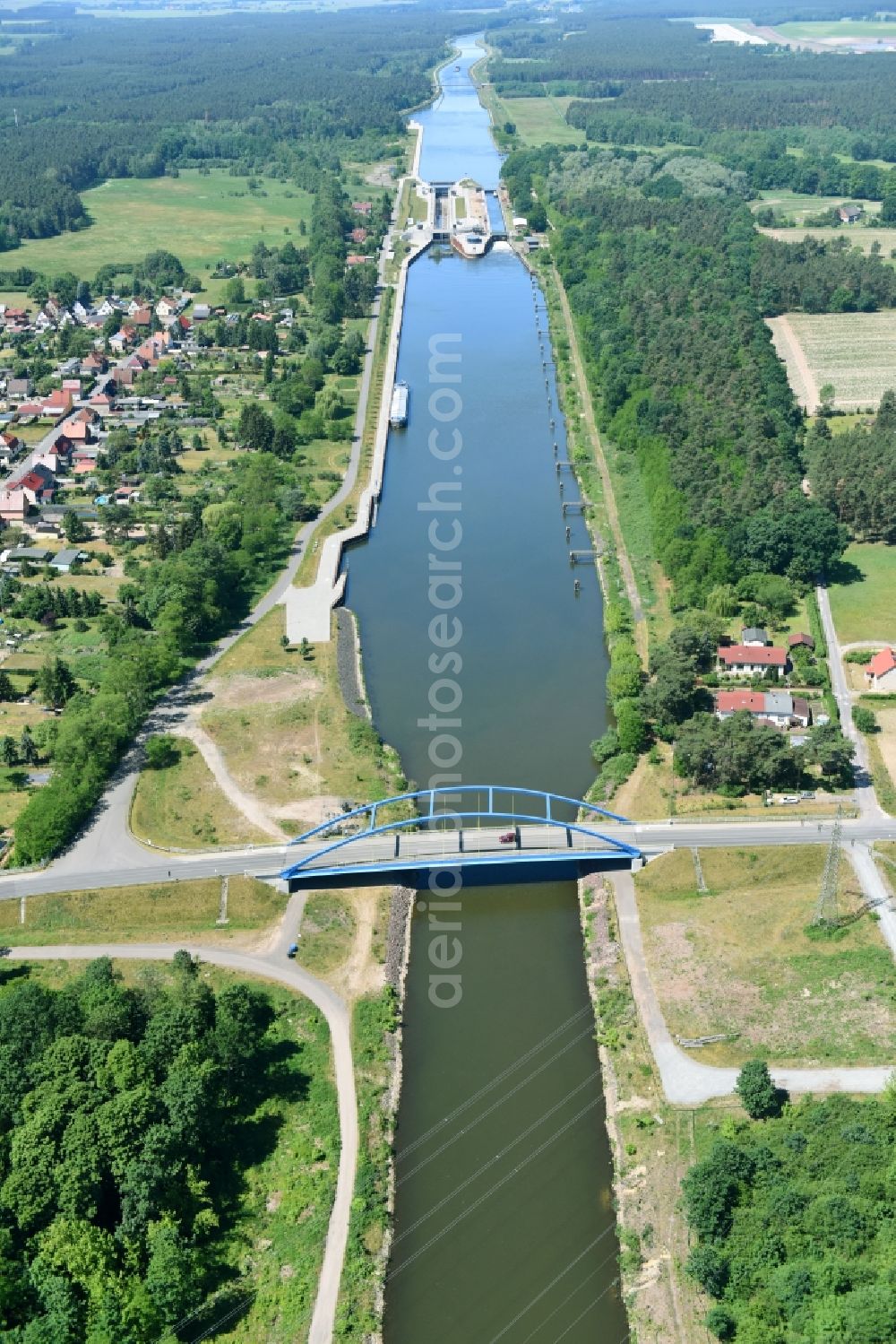 Aerial image Wusterwitz - Strassenbruecke Wusterwitz Bridge across the Elbe-Havel-Canal in the North of Wusterwitz in the state of Brandenburg. The county road L96 takes its course across the blue steel arc bridge