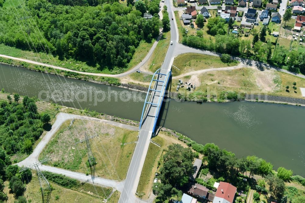 Aerial photograph Wusterwitz - Strassenbruecke Wusterwitz Bridge across the Elbe-Havel-Canal in the North of Wusterwitz in the state of Brandenburg. The county road L96 takes its course across the blue steel arc bridge