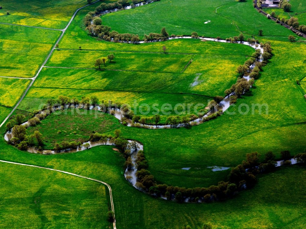 Aerial photograph Bad Hersfeld - River Haune in Bad Hersfeld in the state of Hesse. The river is a right and southern confluence of the Fulda. In the South of the town, it takes its course through meadows and agricultural fields